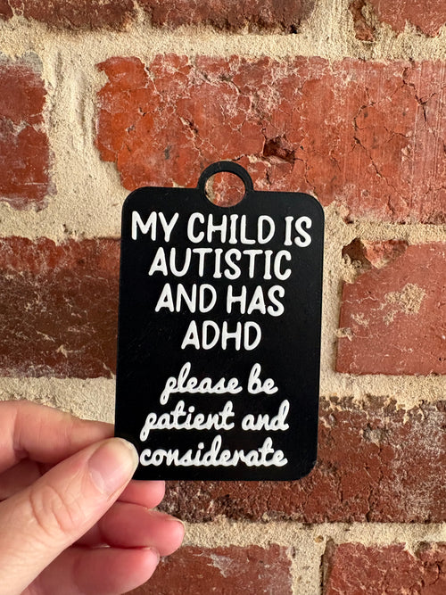 'My Child Is Autistic and has ADHD' Talkies Awareness Tag - Black Background with Coloured Text