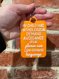 'My Child Has Pathological Demand Avoidance PDA Low Demands' Talkies Awareness Tag - Coloured Background with White Text