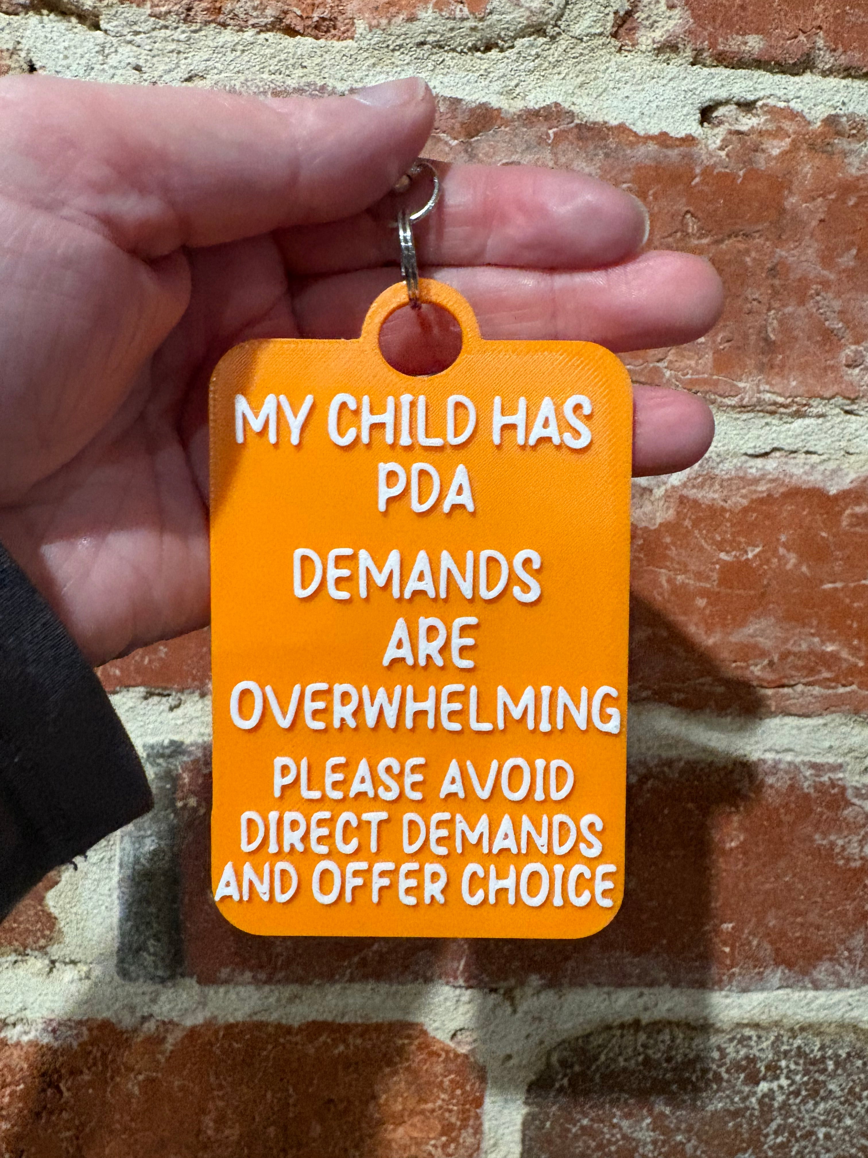 'My Child Has Pathological Demand Avoidance PDA' Talkies Awareness Tag - Coloured Background with White Text