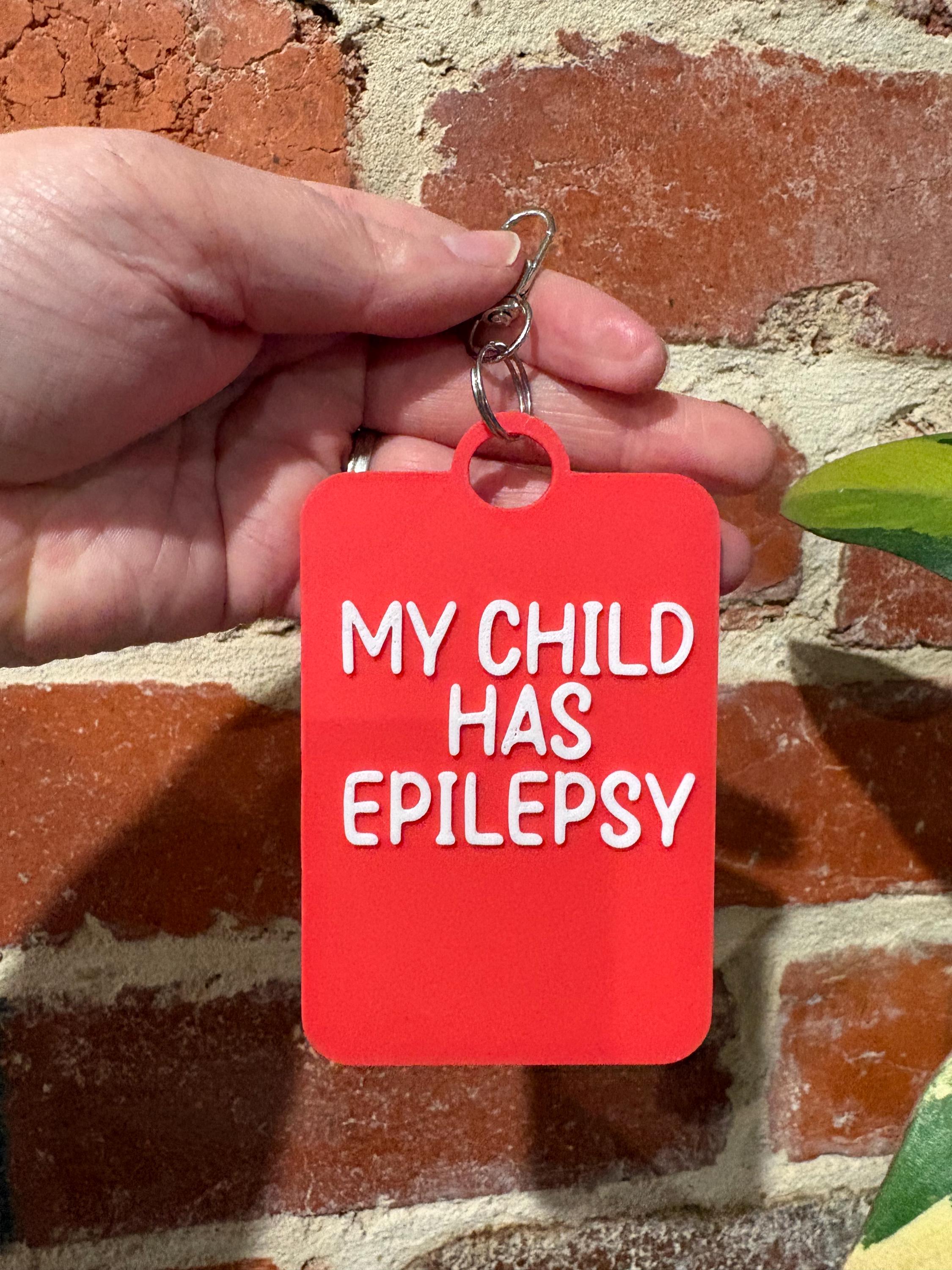 'My Child Has Epilepsy' Talkies Awareness Tag - Coloured Background with White Text