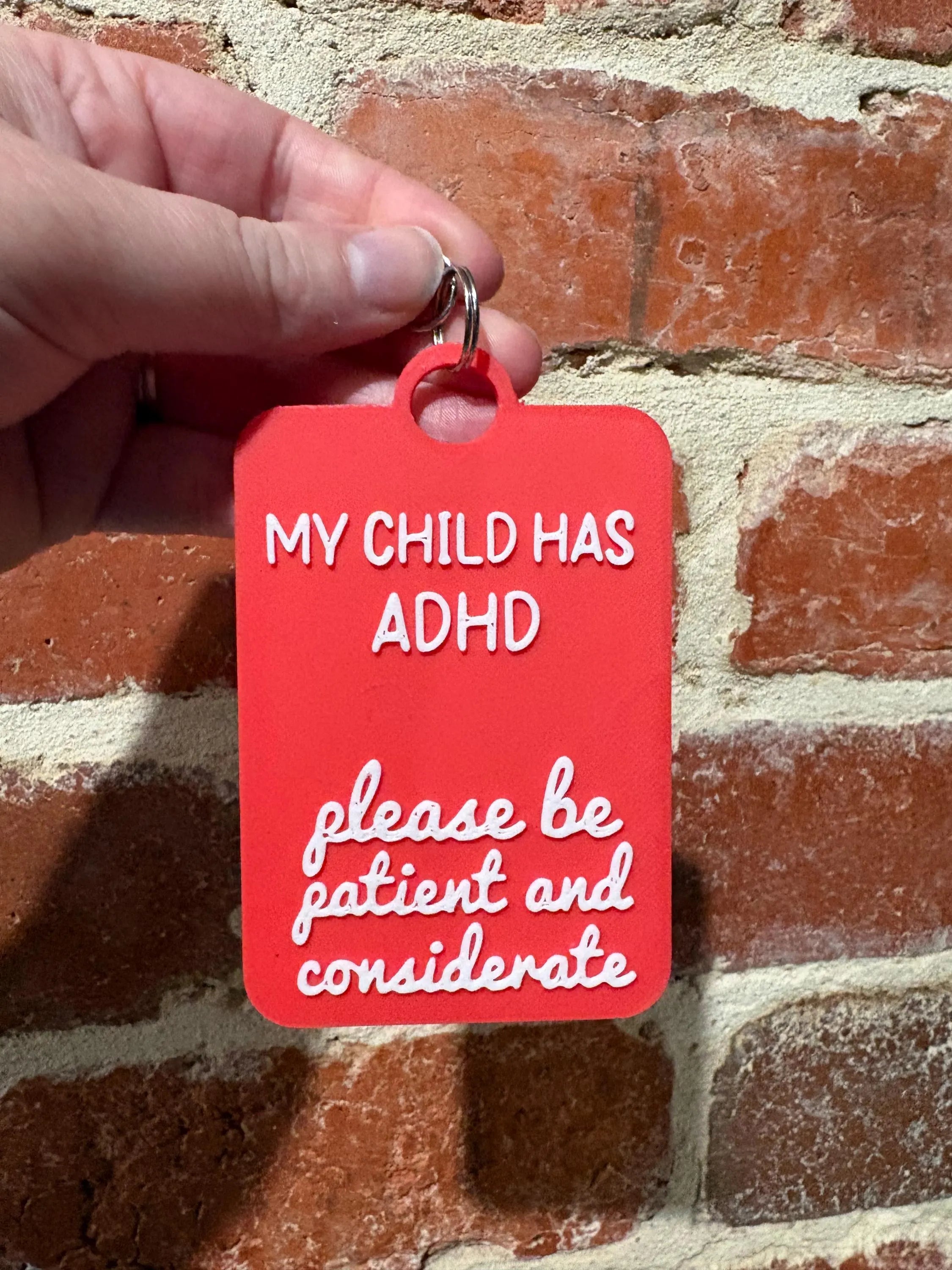 'My Child has ADHD' Talkies Awareness Tag - Coloured Background with White Text