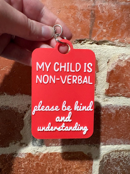 'My Child is Non-Verbal' Talkies Awareness Tag - Coloured Background with White Text