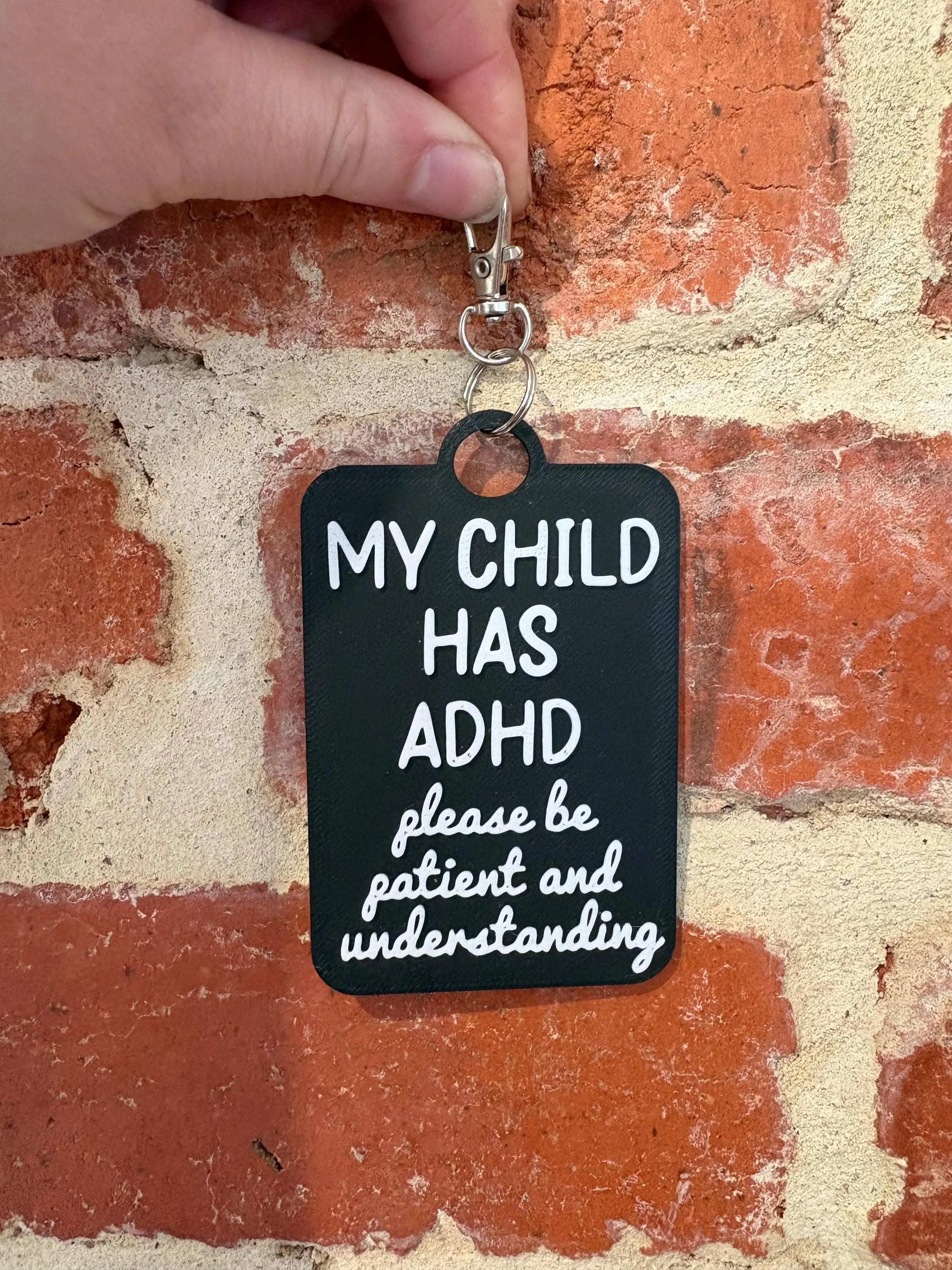 'My Child has ADHD' Talkies Awareness Tag - Coloured Background with White Text