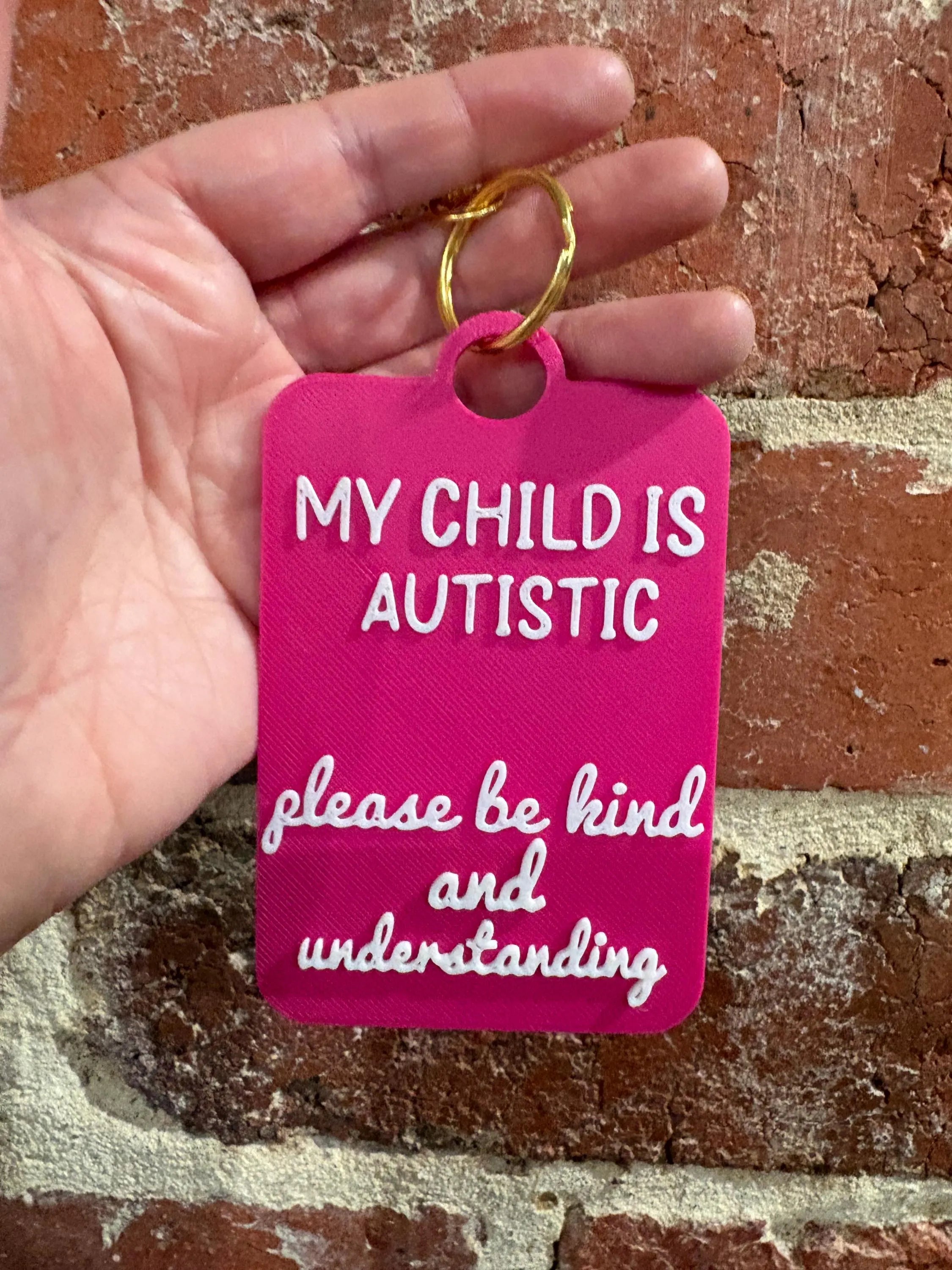 'My Child Is Autistic' Talkies Awareness Tag - Coloured Background with White Text