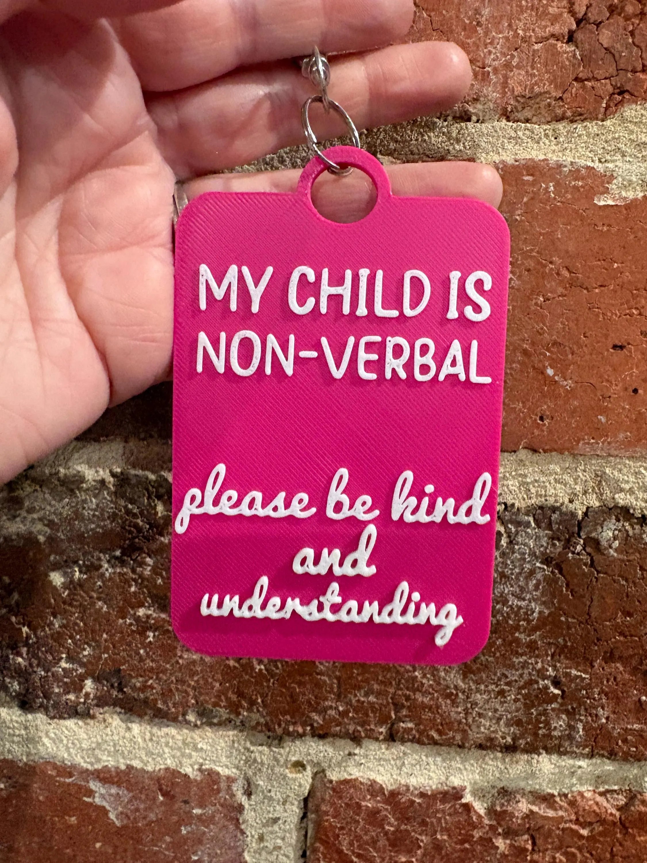 'My Child is Non-Verbal' Talkies Awareness Tag - Coloured Background with White Text