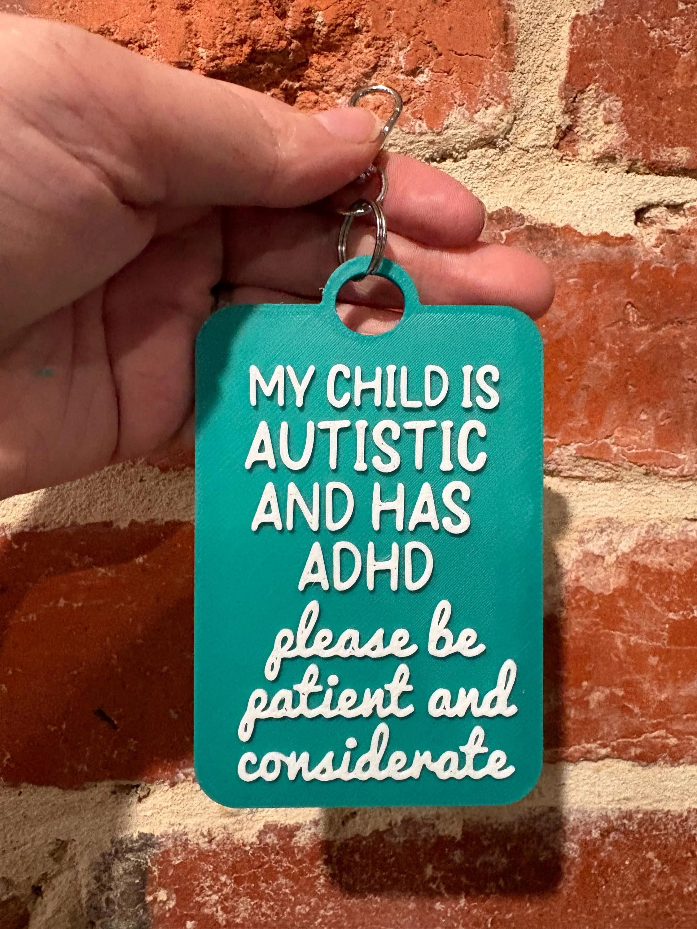'My Child Is Autistic and has ADHD' Talkies Awareness Tag - Coloured Background with White Text
