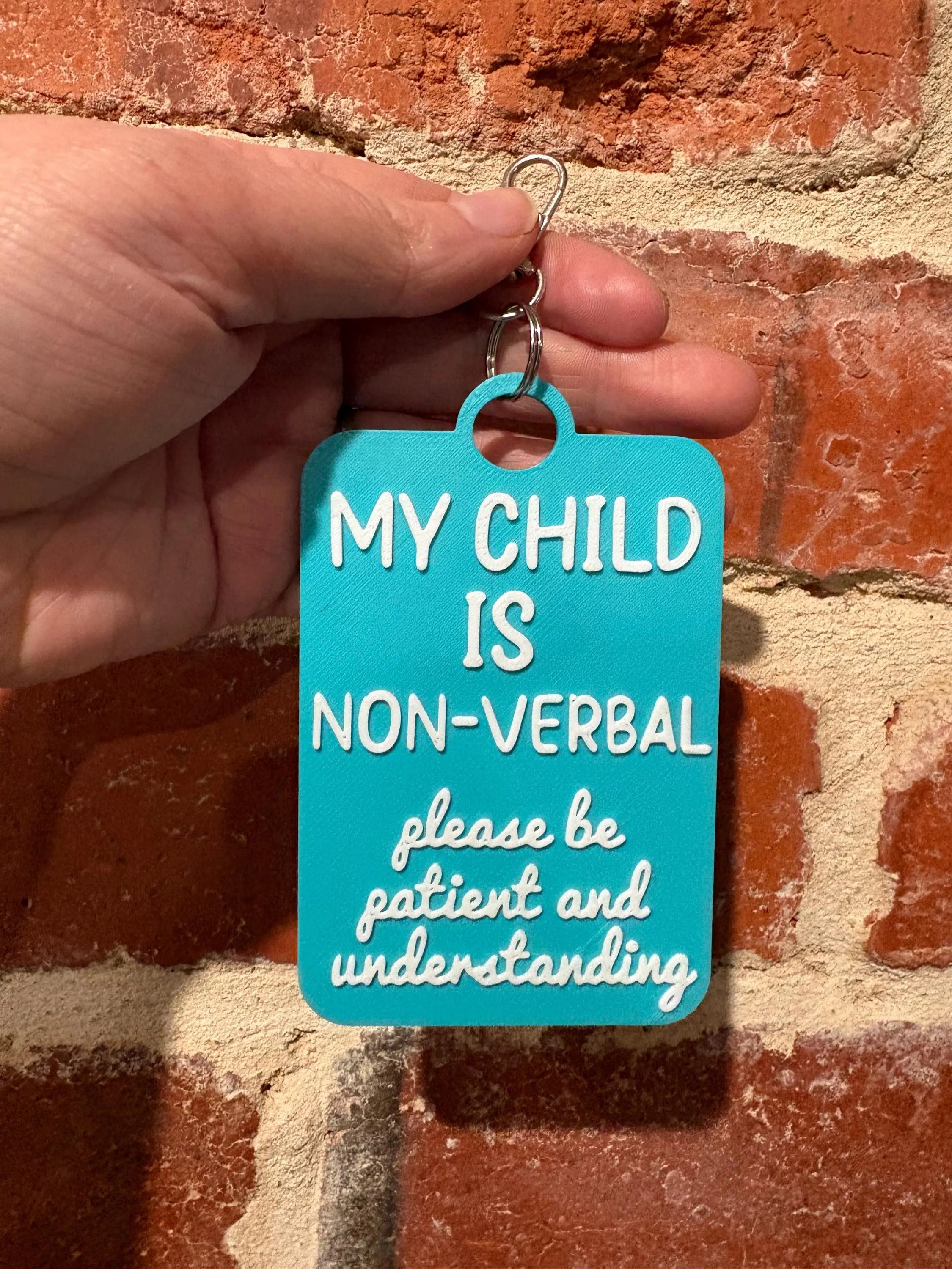 'My Child is Non-Verbal' Talkies Awareness Tag - Coloured Background with White Text