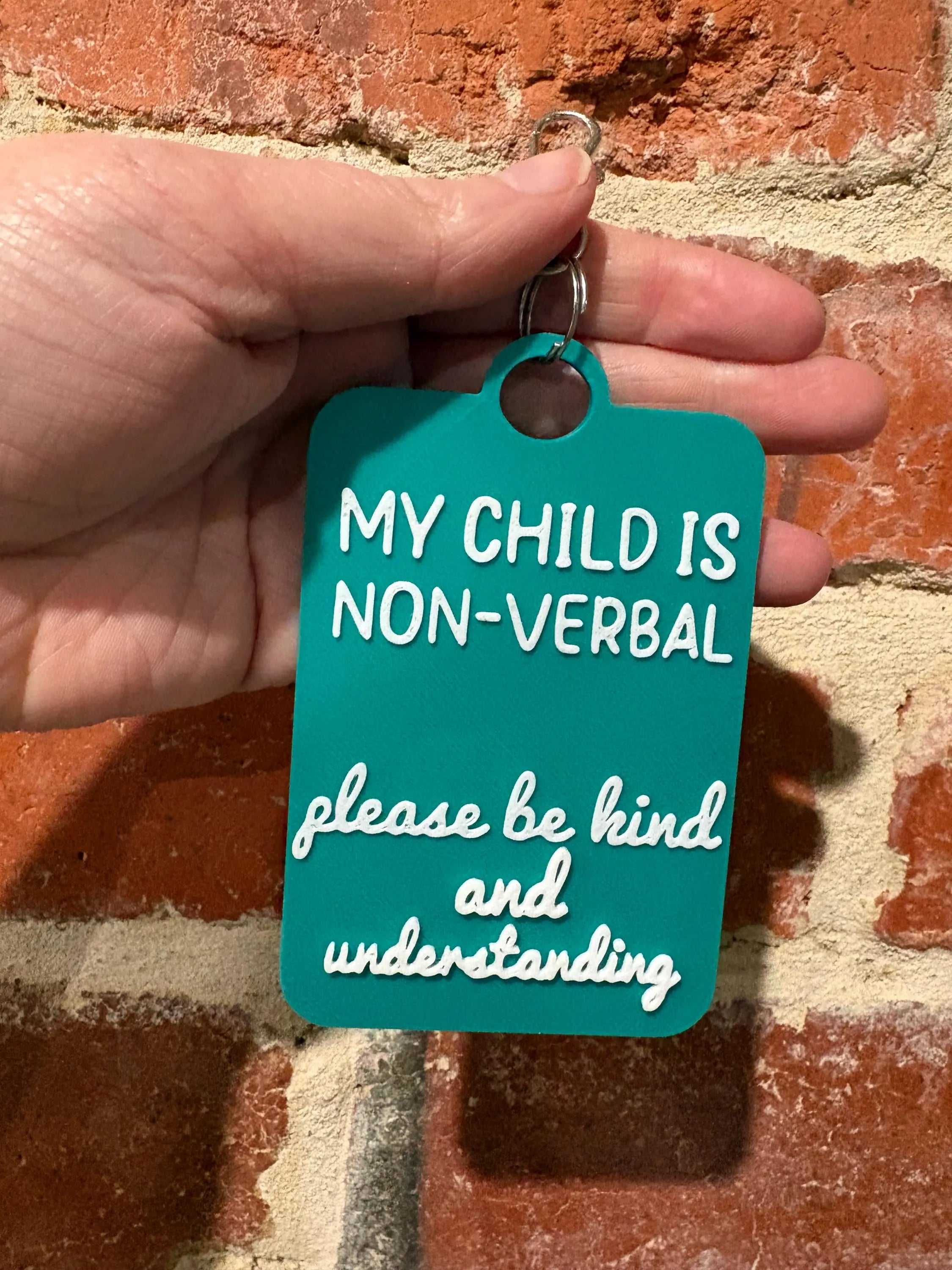'My Child is Non-Verbal' Talkies Awareness Tag - Coloured Background with White Text