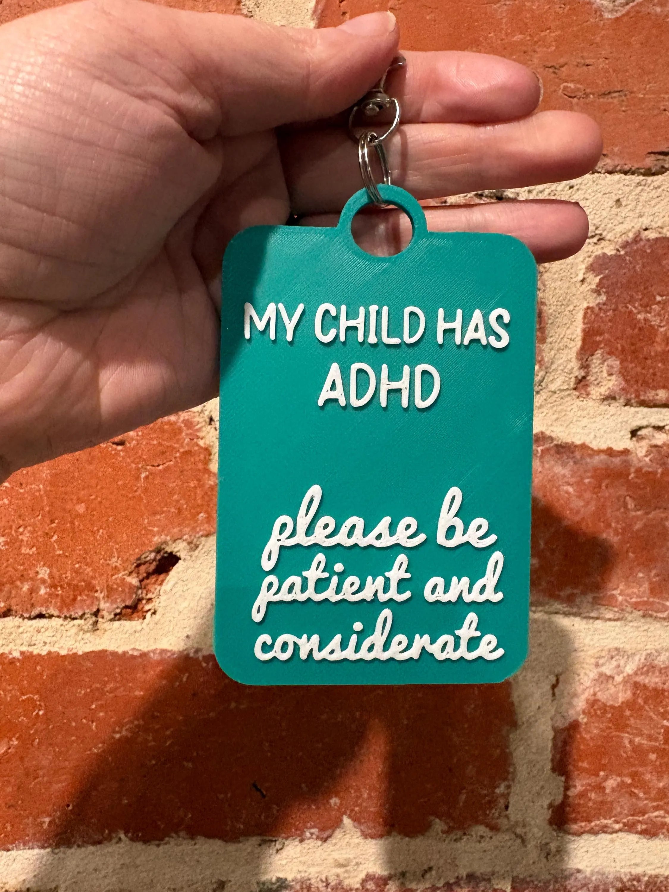 'My Child has ADHD' Talkies Awareness Tag - Coloured Background with White Text